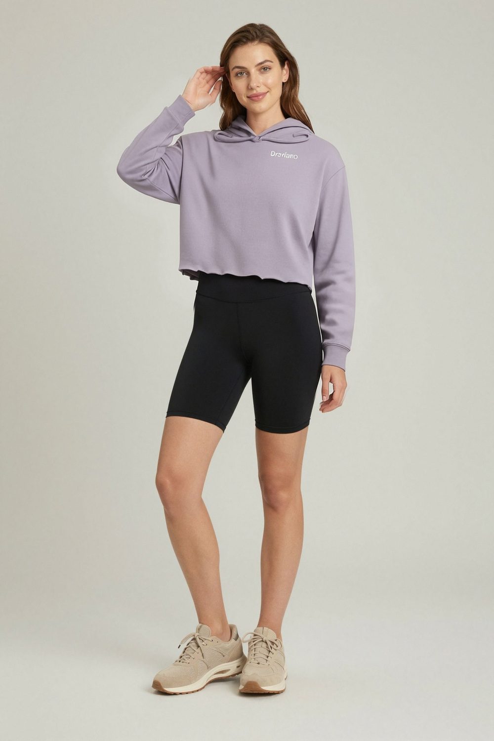 not specified hoodie on female model in desert adventure setting professional fashion photography